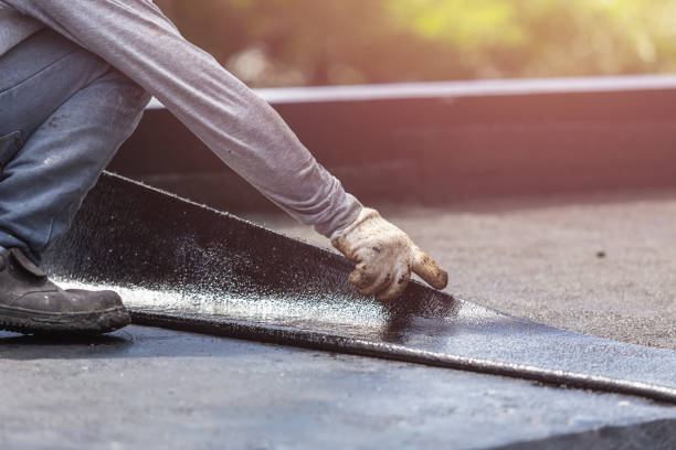 Professional Waterproofing technician working in Melville, NY